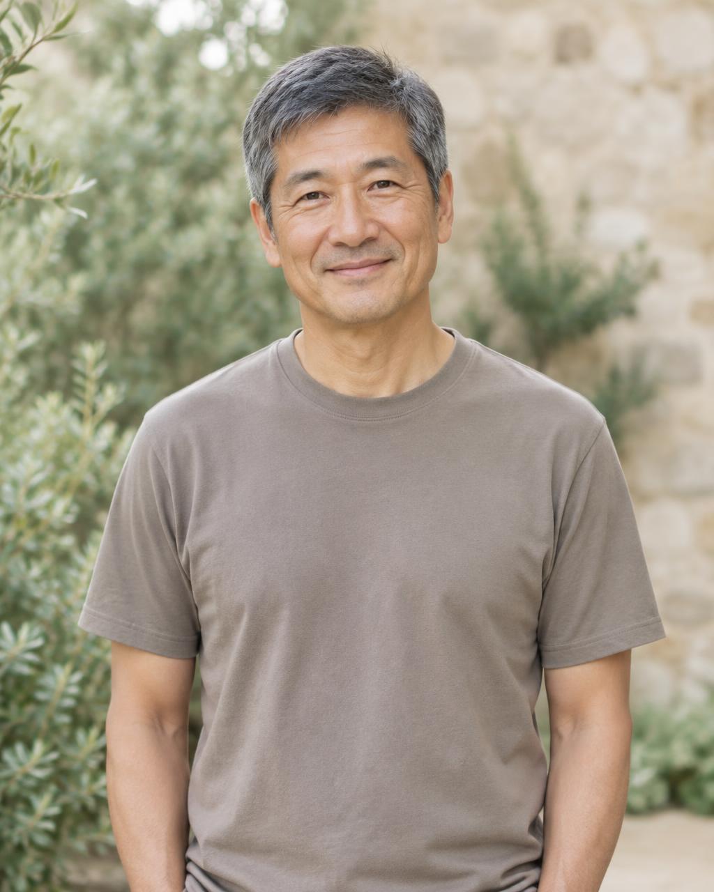 AI-generated adult East Asian male model wearing a plain taupe shirt with no lettering
